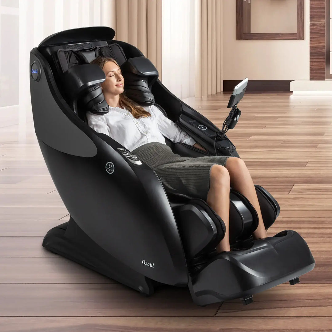 A Woman using an Osaki OP-4D Master massage chair in a modern room.