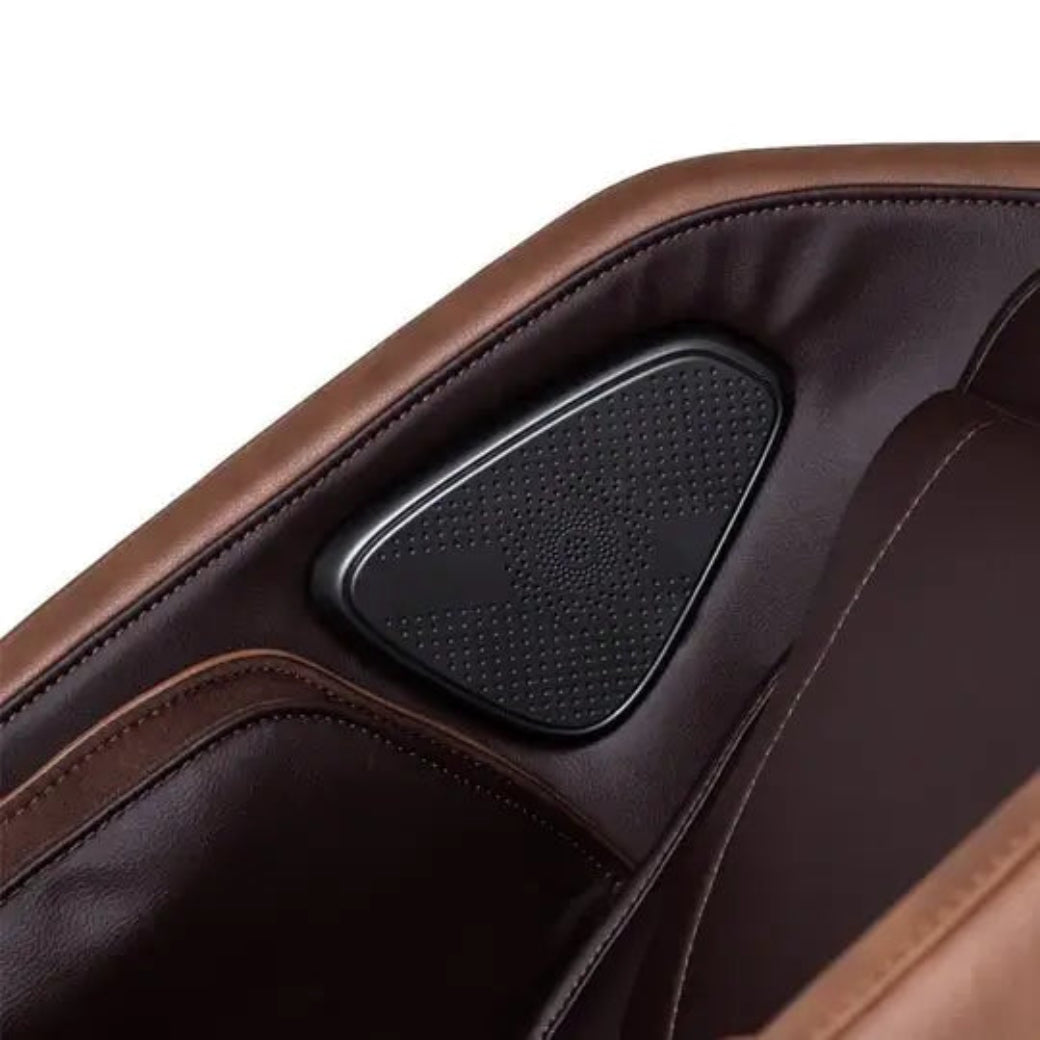Brown massage chair with a black control panel on a white background